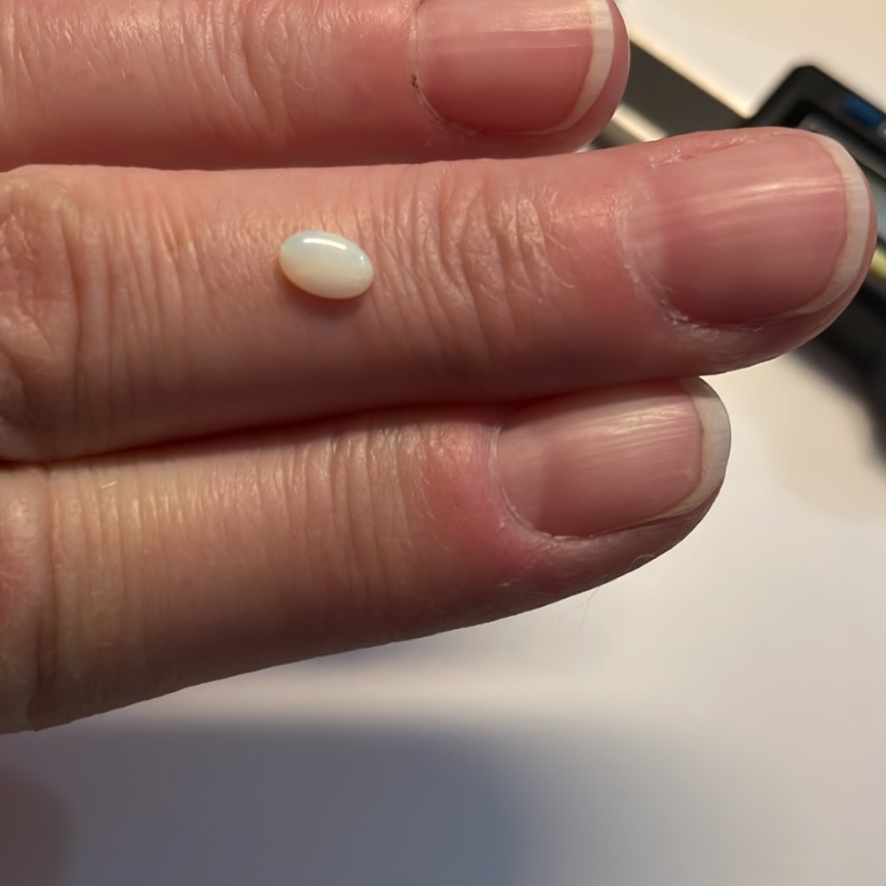 3 Opals And One Tanzanite Oval Gems View 5
